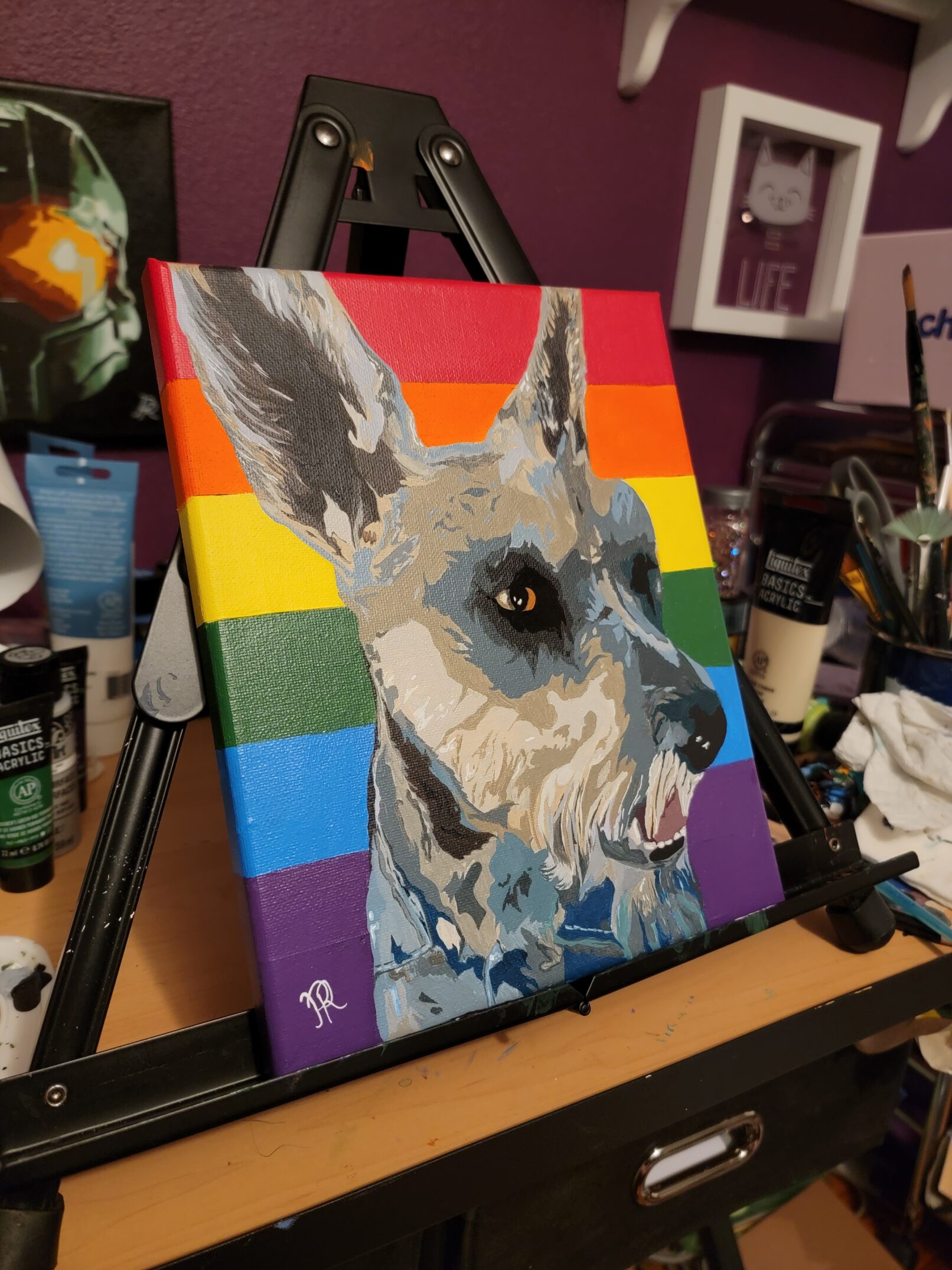 an acrylic painting of a gray dog in front of a rainbow background